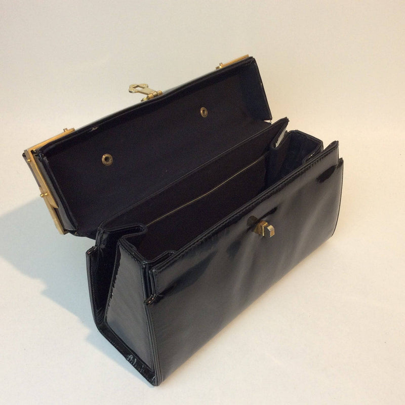 Black vintage briefcase in patent leather with gold hardware