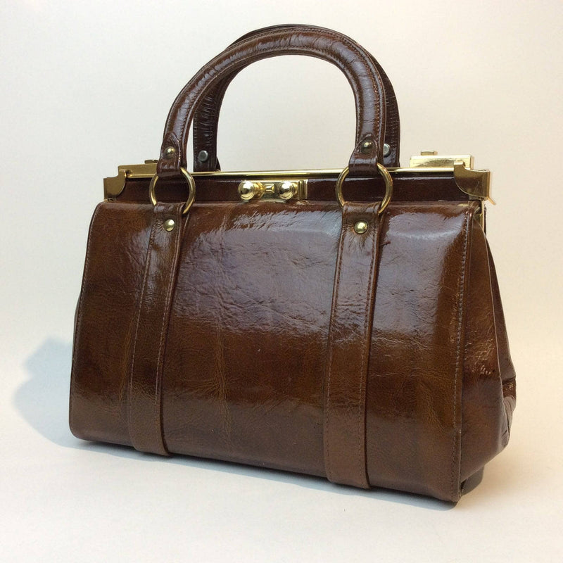 1960s Brown Patent Leather Frame Bag with 2 handles from Charisma.  sold by bohemevintage.com Montréal 
