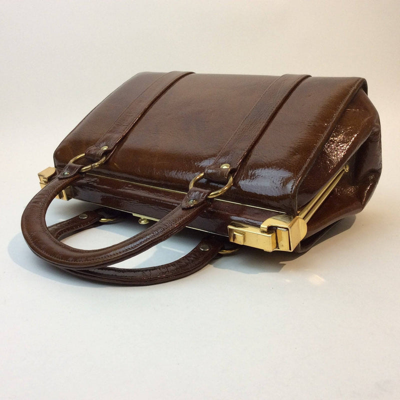 1960s Brown Patent Leather Frame Bag with 2 handles from Charisma. sold by bohemevintage.com Montréal