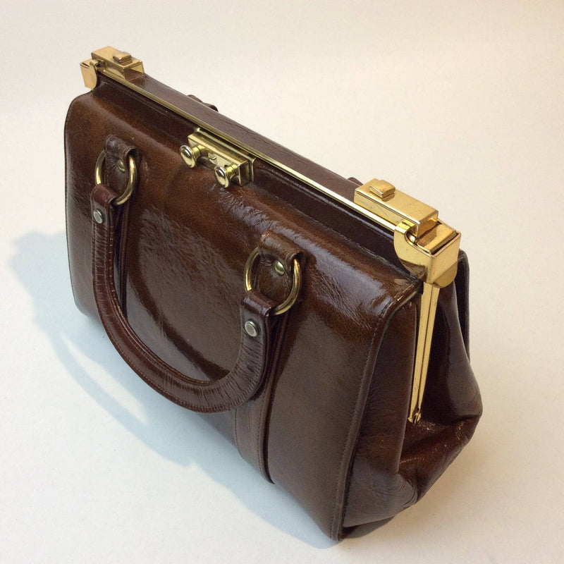 1960s Brown Patent Leather Frame Bag with 2 handles from Charisma. sold by bohemevintage.com Montréal