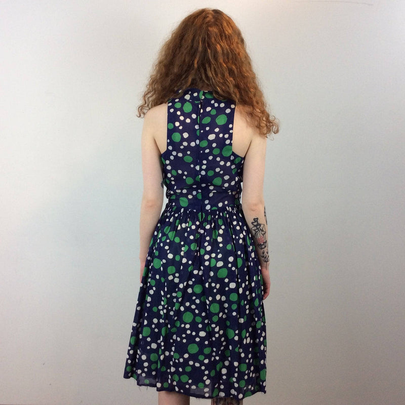 Back view of 1960s Dotted Print Knee-length Sleeveless Dress Size Small. Sold by bohemevintage.com Montréal