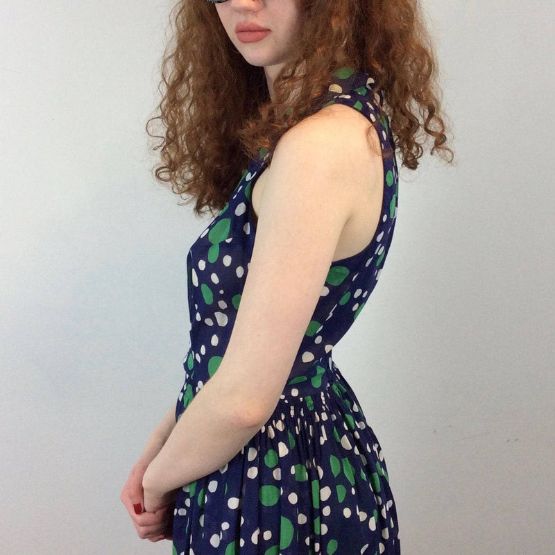 Side View of 1960s Dotted Print Knee-length Sleeveless Dress Size Small. Sold by bohemevintage.com Montréal