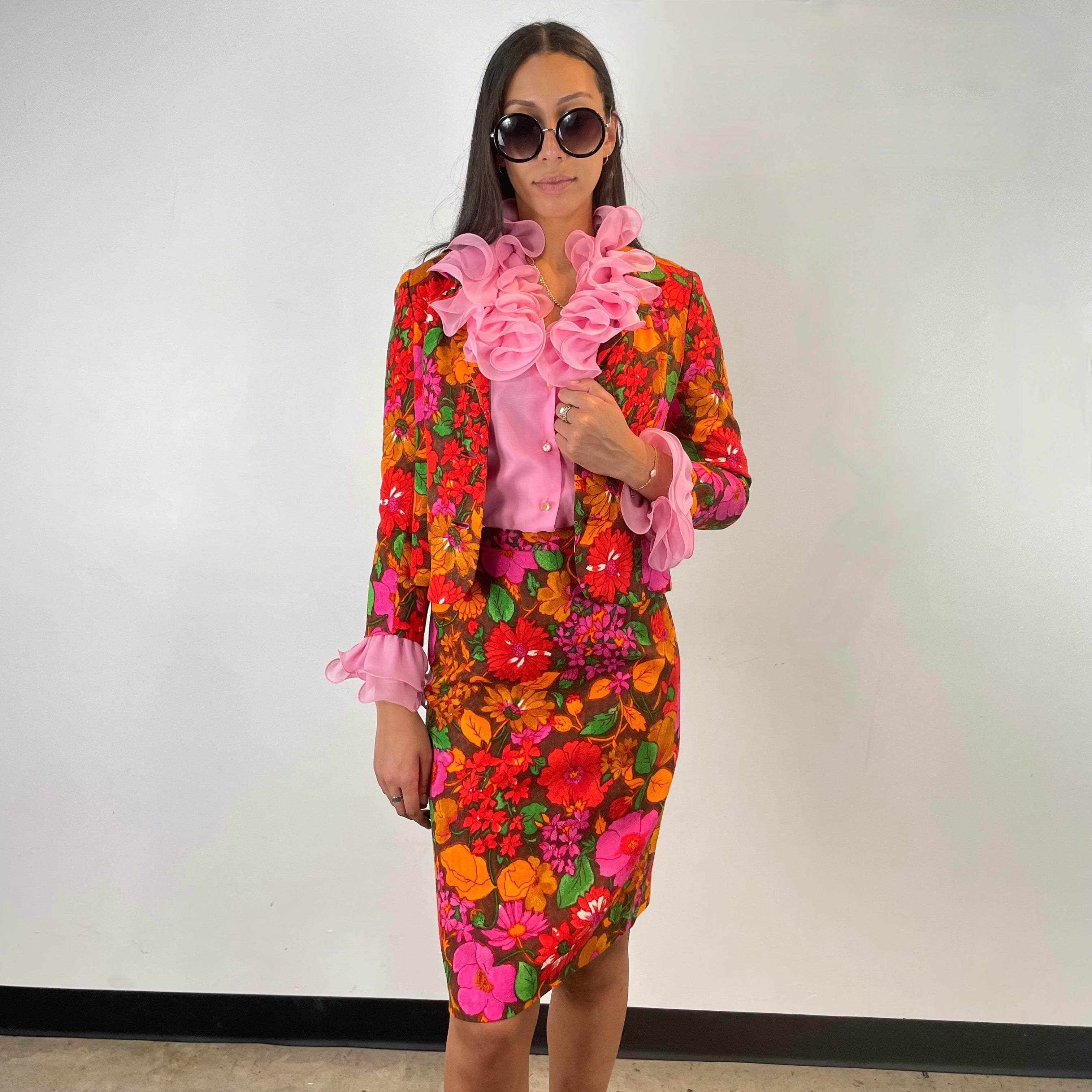 Blazer and skirt from 1960s Floral Print Three piece Skirt Set worn with 1970s pink flounce blouse Size small sold at bohemevintage.com Montreal