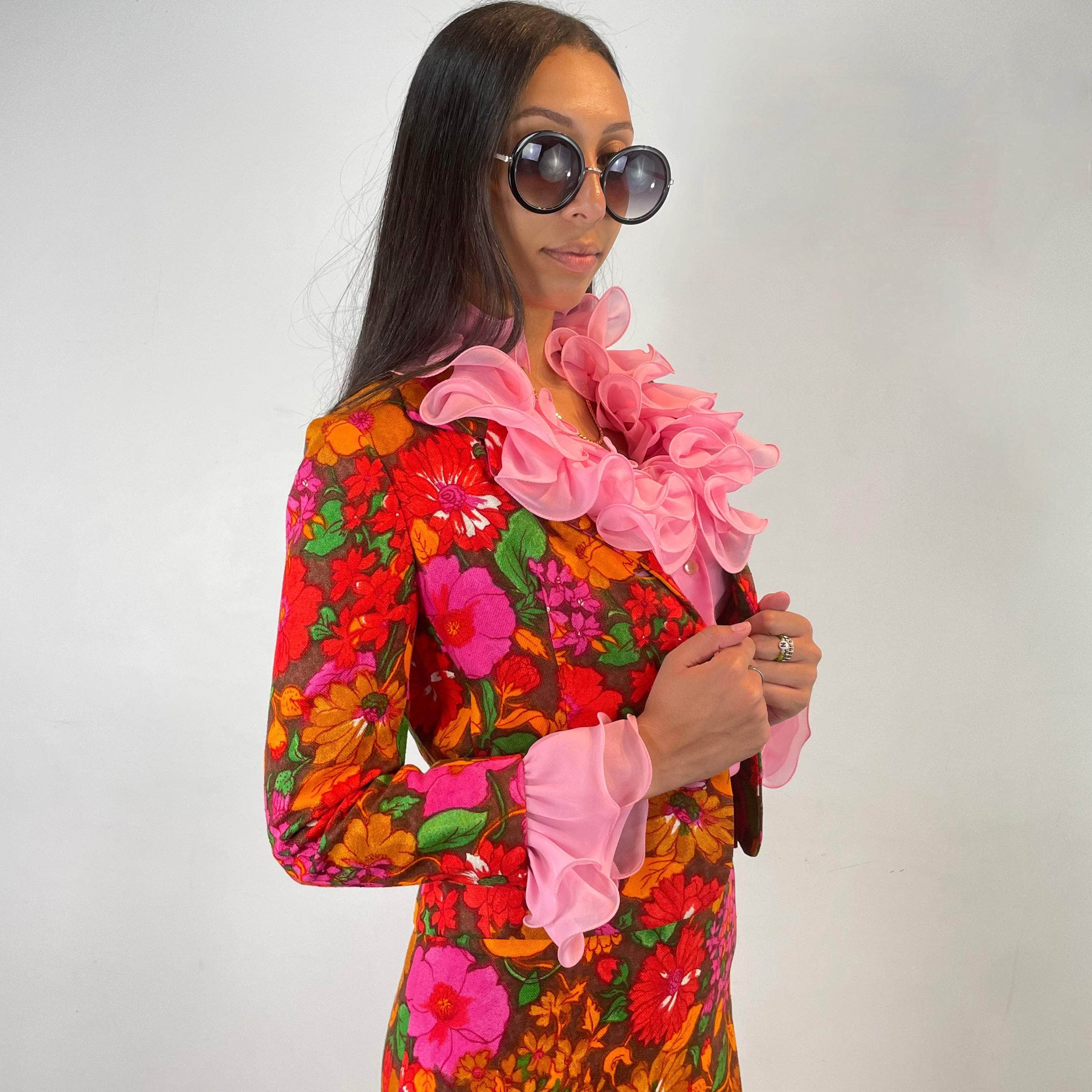 Blazer and skirt from 1960s Floral Print Three piece Skirt Set worn with 1970s pink flounce blouse Size small sold at bohemevintage.com Montreal