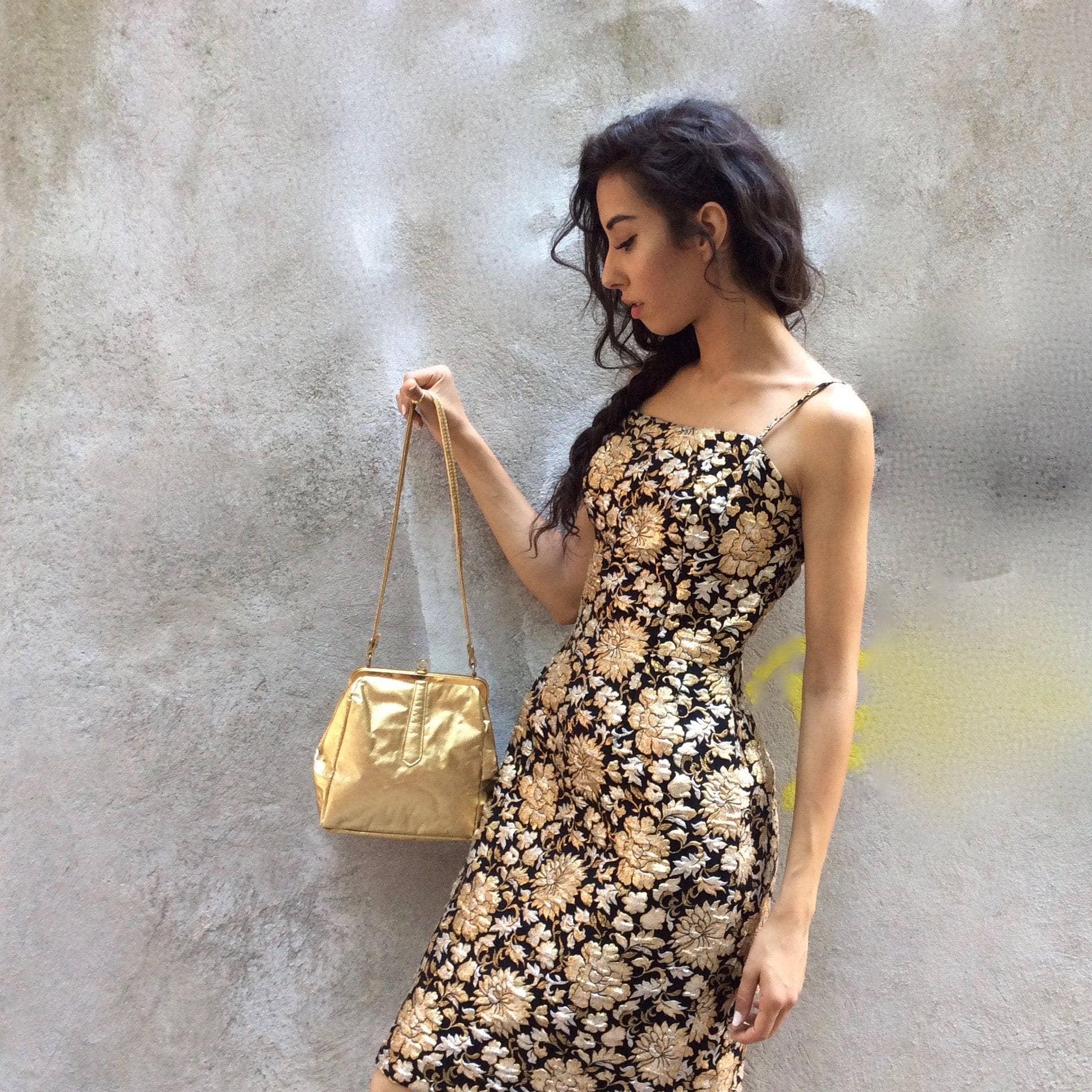 Side view of 1960s Gold, Silver & Black Brocade Knee-length Sheath Dress Size Small sold by bohemevintage.com Montréal