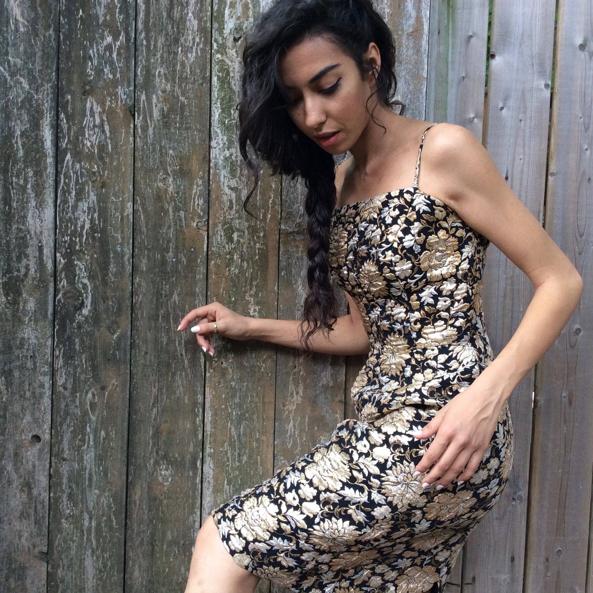 Side view of 1960s Gold, Silver & Black Brocade Knee-length Sheath Dress Size Small. Sold by bohemevintage.com Montréal