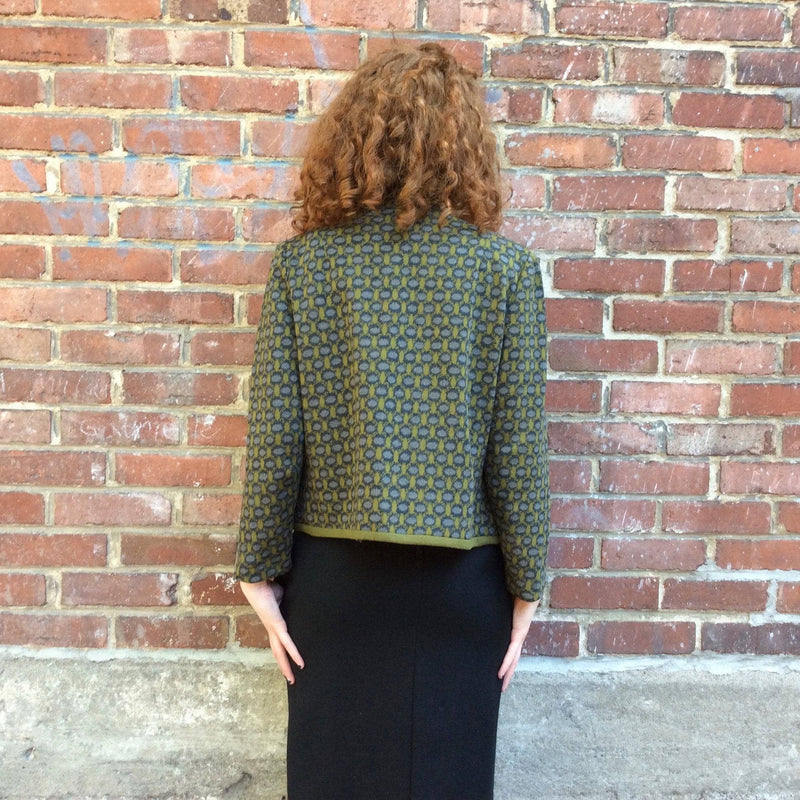 Back View of 1960s Green and Grey ¾ Sleeve Boxy shape Wool Knit Blazer. Sold by bohemevintage.com Montréal