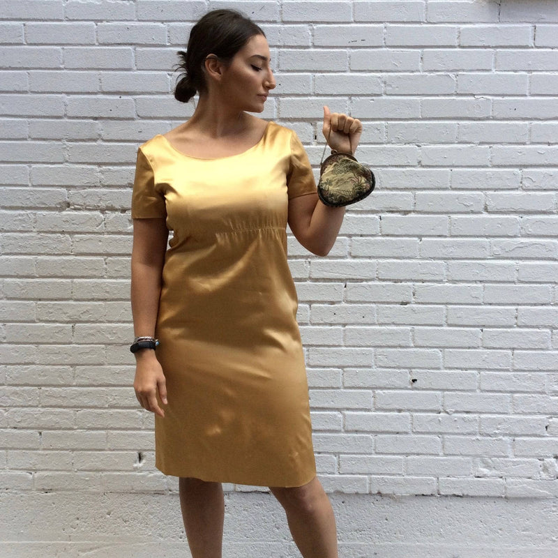 1960s Knee-length Gold Satin Shift Dress. sold by bohemevintage.com Montréal