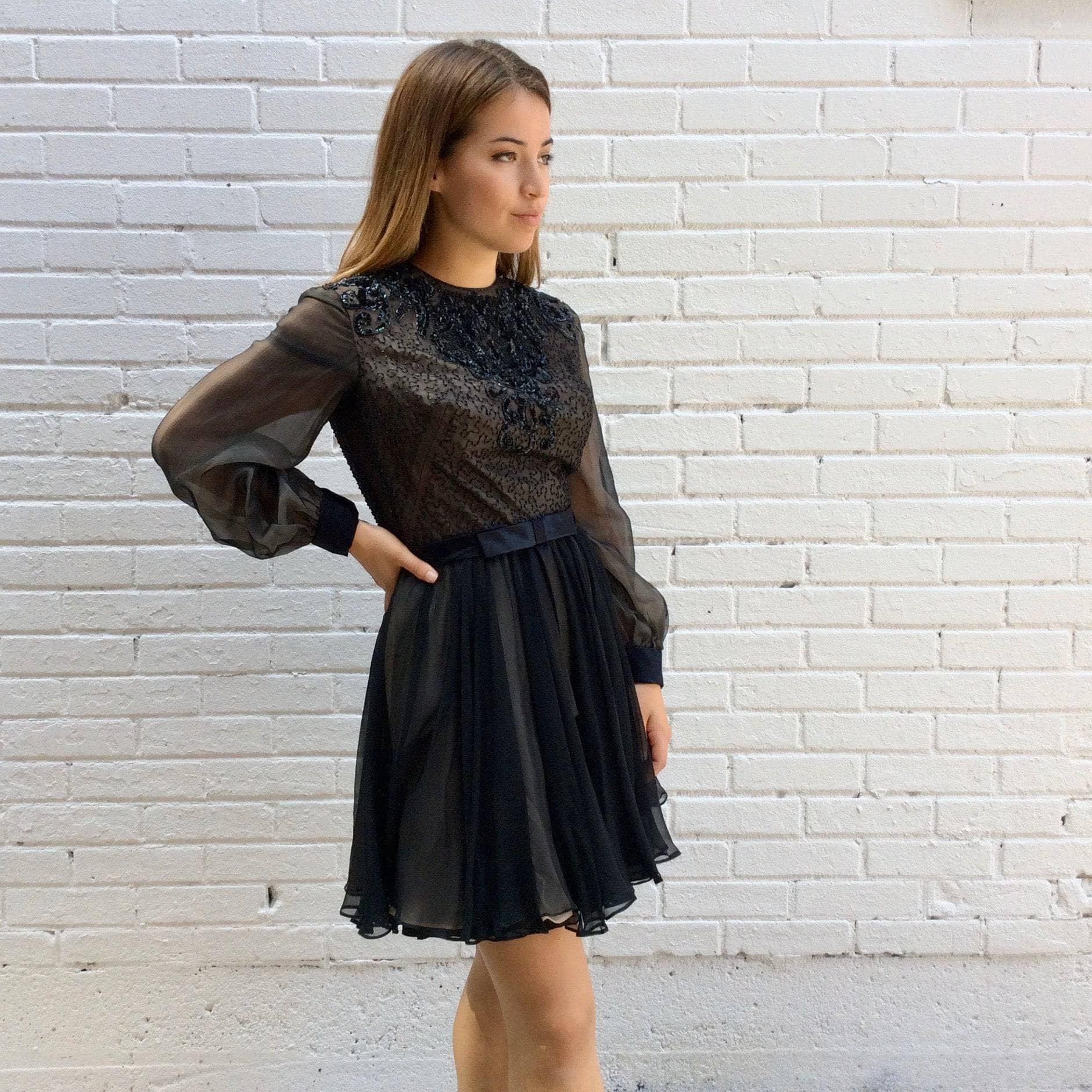 Side view of 1960s "Lily Simon" Sequin and Beaded Silk Chiffon Couture Mini Dress Size Small sold by bohemevintage.com Montréal