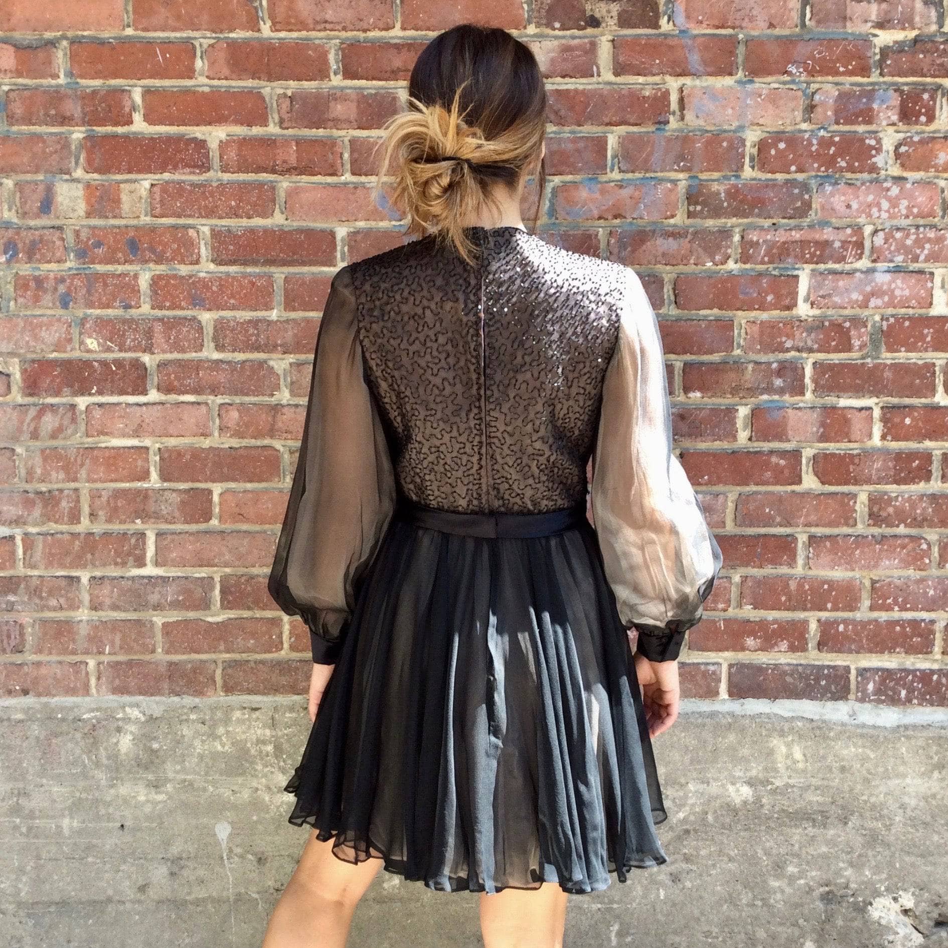 Back View of 1960s "Lily Simon" Sequin and Beaded Silk Chiffon Couture Mini Dress Size Small sold by bohemevintage.com Montréal