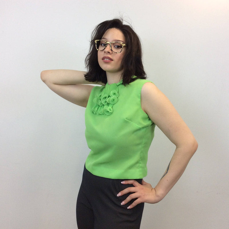 1960s Lime Green Sleeveless Cropped Blouse with Jabot Collar. Sold by bohemevintage.com Montréal