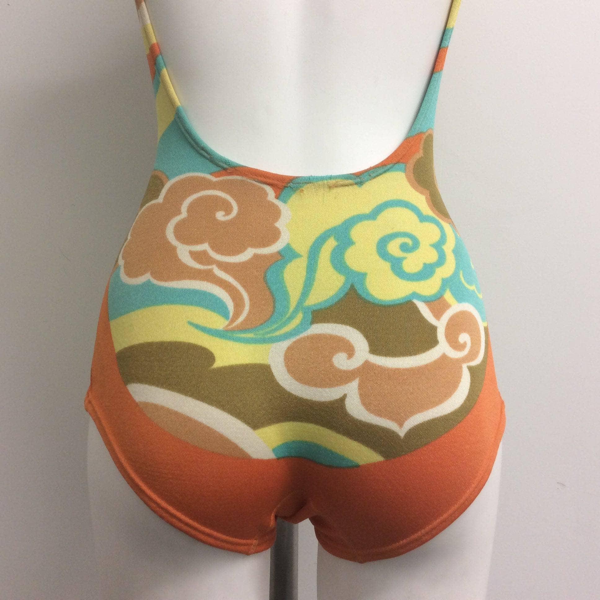 Back view close up of 1960s One-piece Open Back Bathing Suit Size Small. Sold by bohemevintage.com Montreal