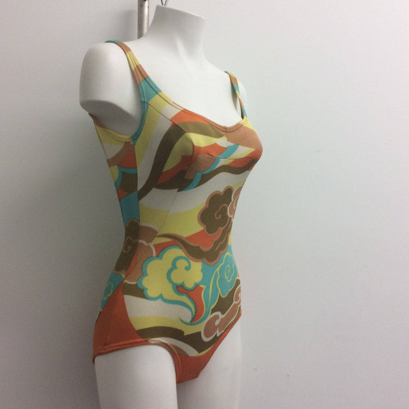 Side view of 1960s One-piece Open Back Bathing Suit Size Small. Sold by bohemevintage.com Montreal