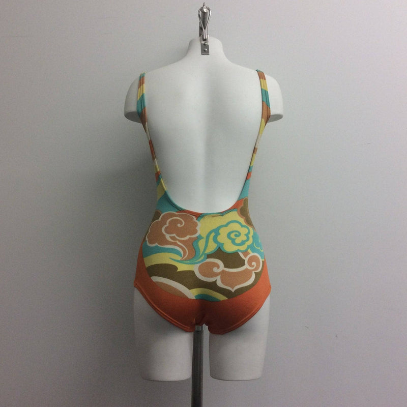 Back view of 1960s One-piece Open Back Bathing Suit Size Small. Sold by bohemevintage.com Montreal