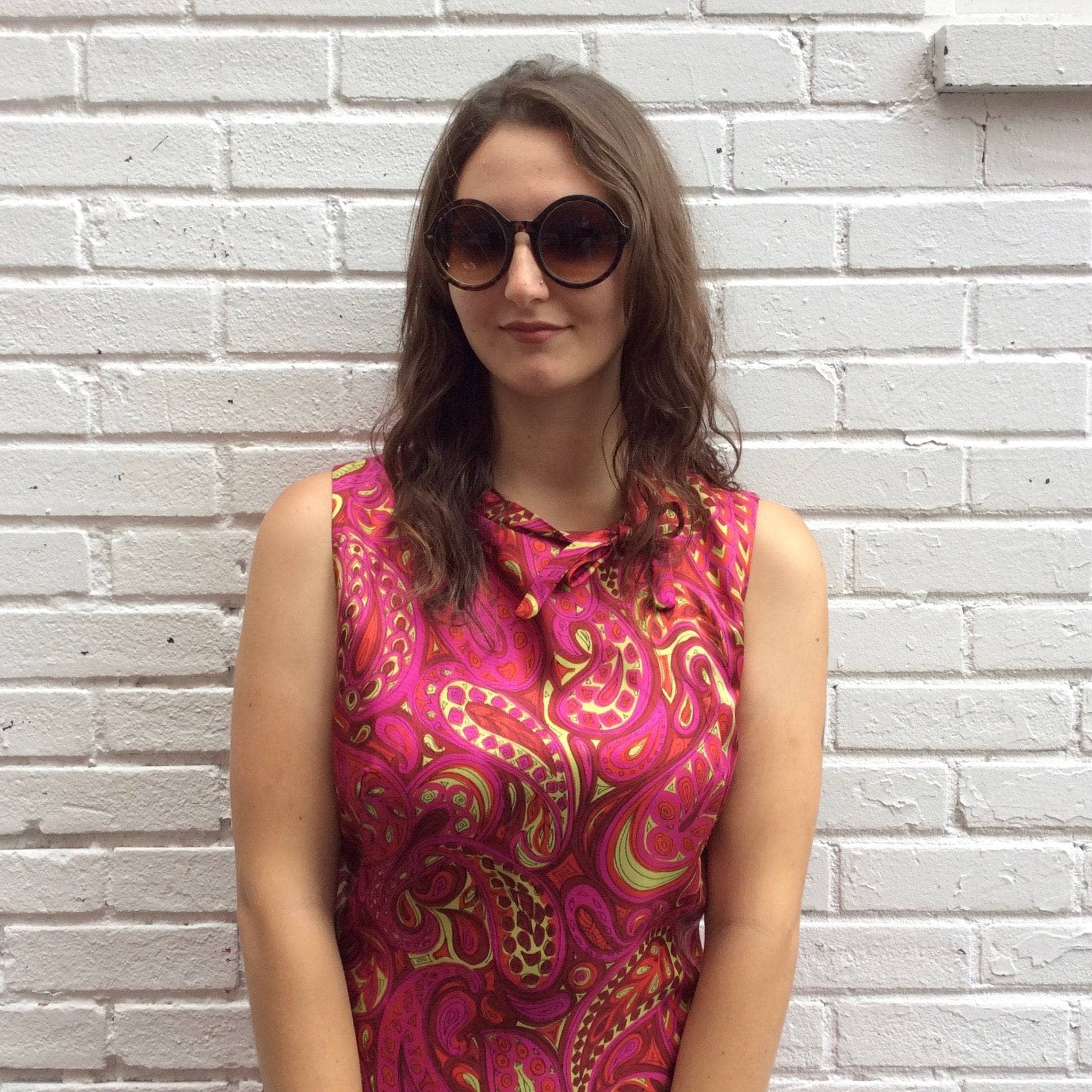 Upper view of Vintage, Handmade 1960s Paisley Bold Print Shift Dress Size Small/Medium. Sold by bohemevintage.com Montreal