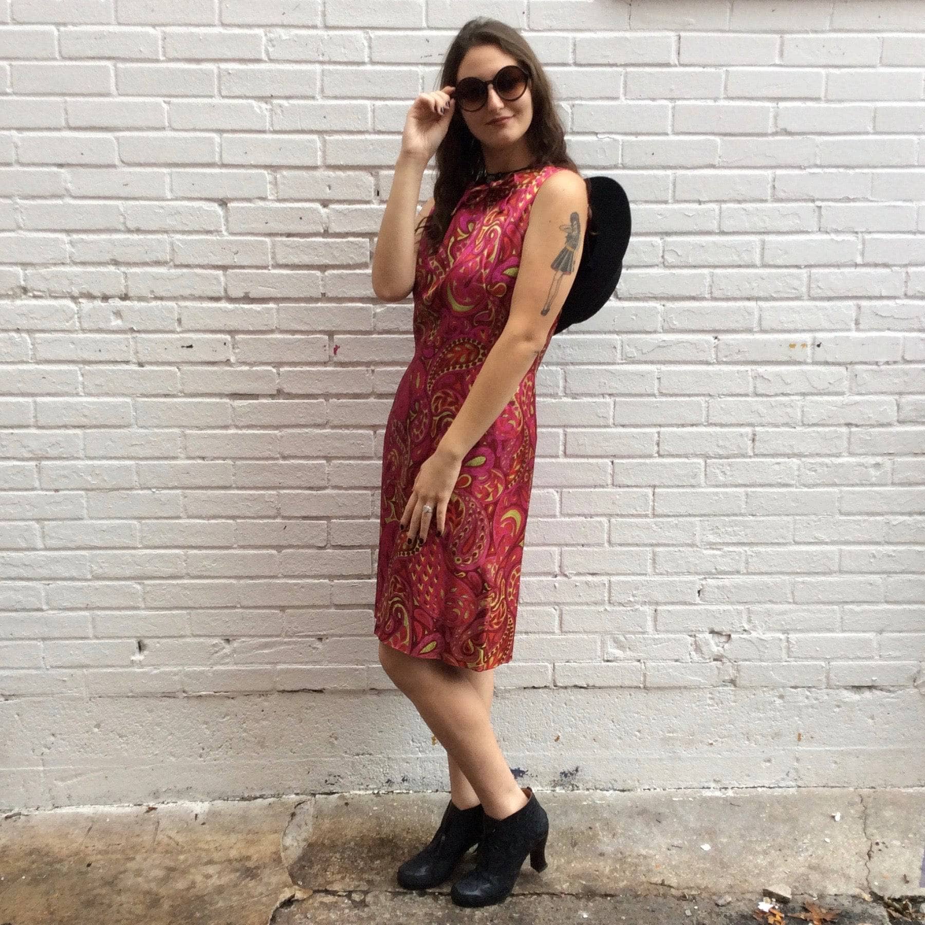 Side view of Vintage, Handmade 1960s Paisley Bold Print Shift Dress Size Small/Medium. Sold by bohemevintage.com Montreal