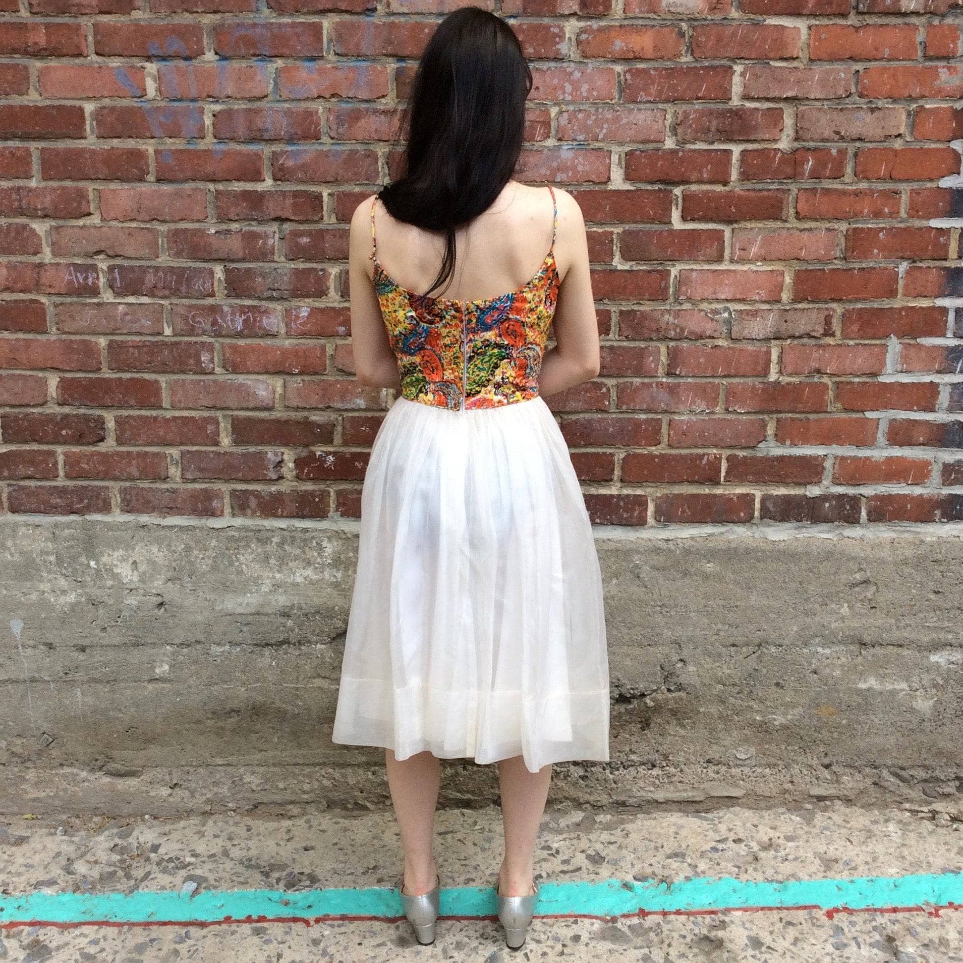 Back view of 1960s Petite Silk Cocktail Dress size extra small/ Small sold by bohemevintage.com Montréal