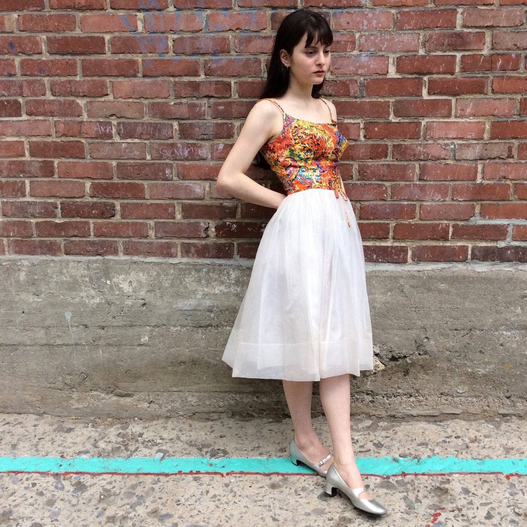 Side View of 1960s Petite Silk Cocktail Dress size extra small/ Small sold by bohemevintage.com Montréal