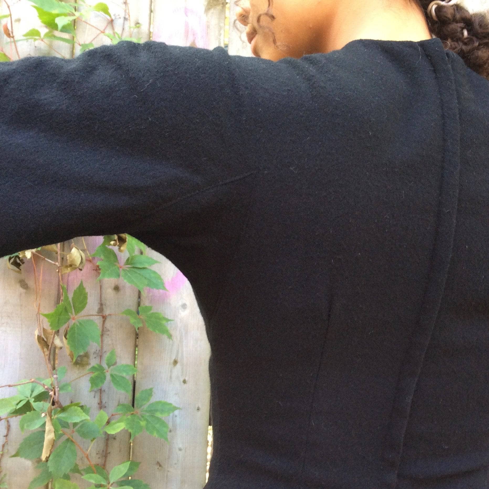 Detail view of sleeve construction of 1960s Short Sleeve Black Wool Dress Size Small sold by bohemevintage.com Montreal