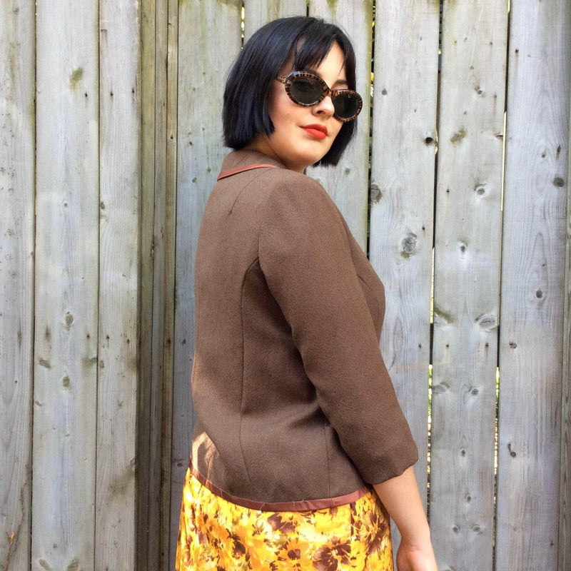 Side view of 1960s ¾ Sleeve Boxy Shape short Brown Wool English Blazer size Medium sold by Boheme Vintage Montreal