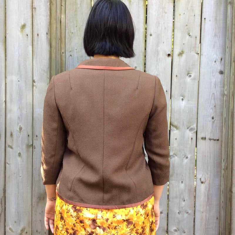 Back view of 1960s ¾ Sleeve Boxy Shape short Brown Wool English Blazer size Medium sold by Boheme Vintage Montreal