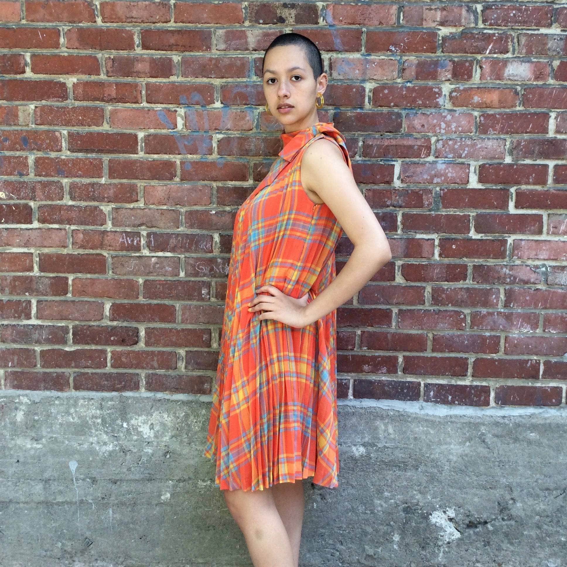 Side View of 1960s Sunburst Pleated Tent Dress Size Small/Medium. Sold by bohemevintage.com Montreal