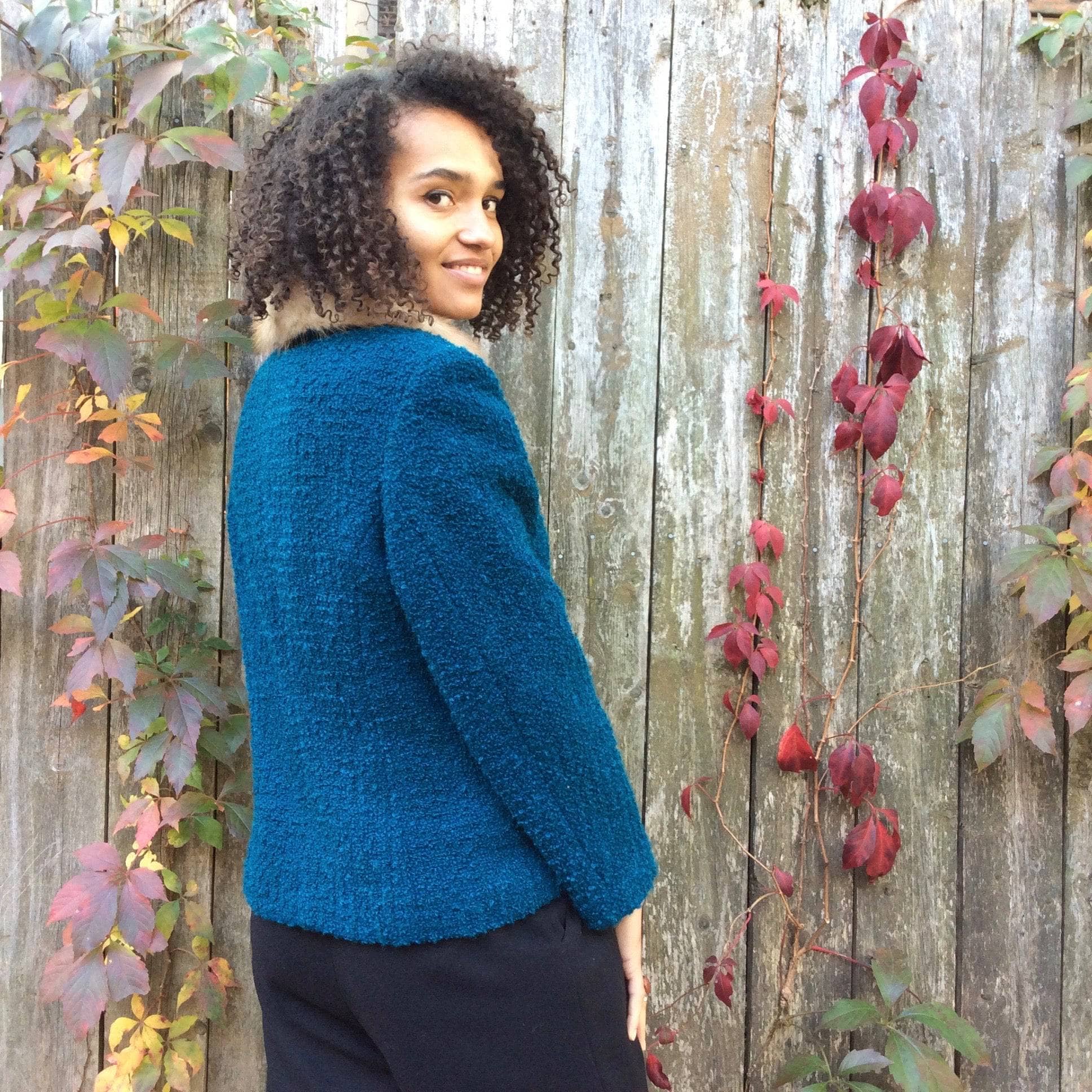 Back view of 1960s Teal Wool Jacket With Fur Collar Size Medium sold by bohemevintage.com Montréal