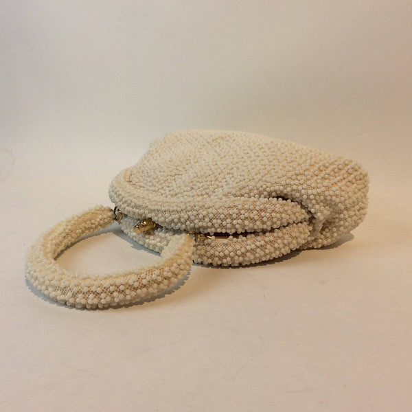 Corde-Bead 1960s White Beaded Soft Shell Evening Bag. Sold by bohemevintage.com Montreal