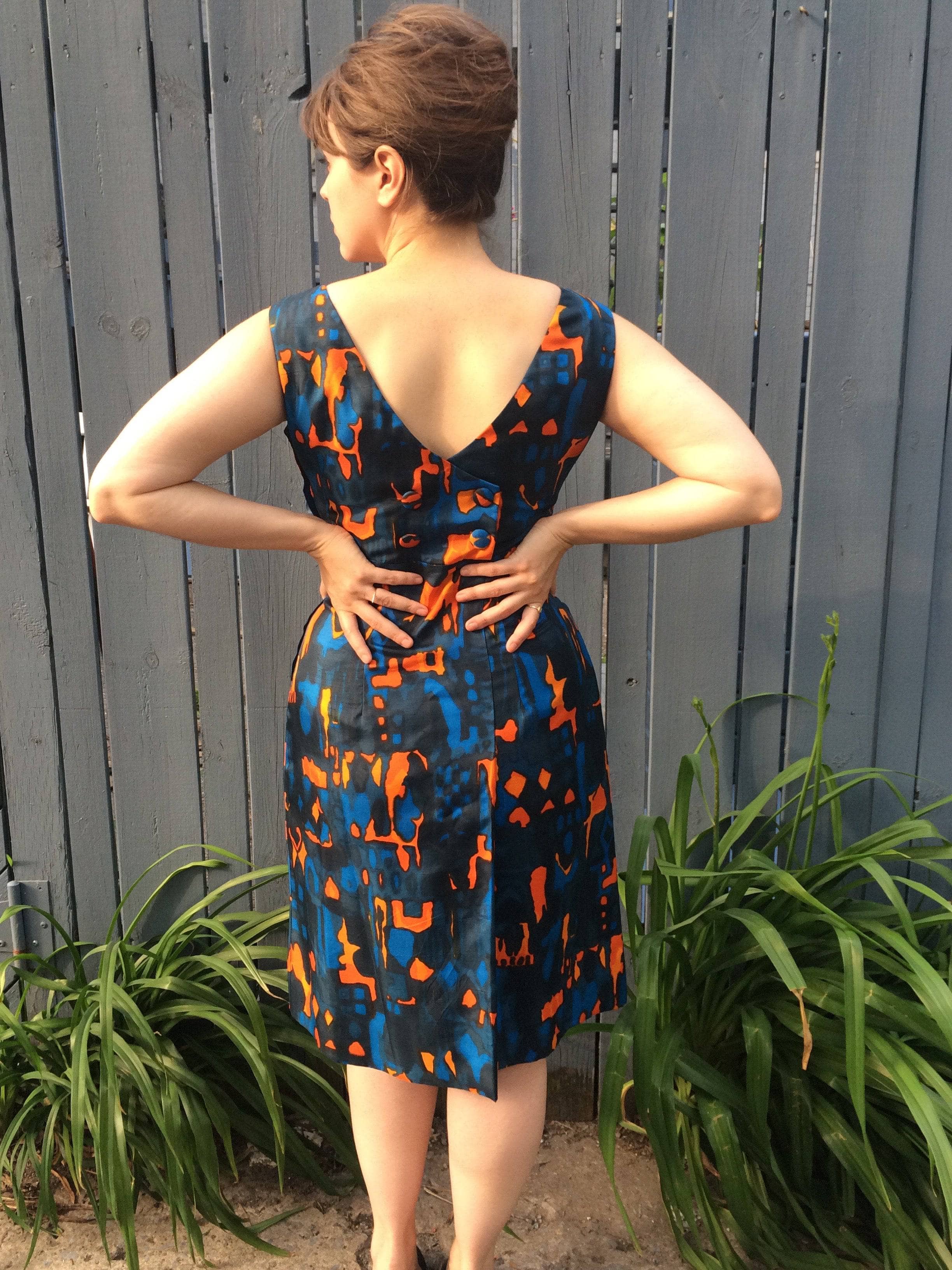 Back view of 1960s Wrap Back Sleeveless Silk Cocktail Dress Size Medium sold by bohemevintage.com Montréal