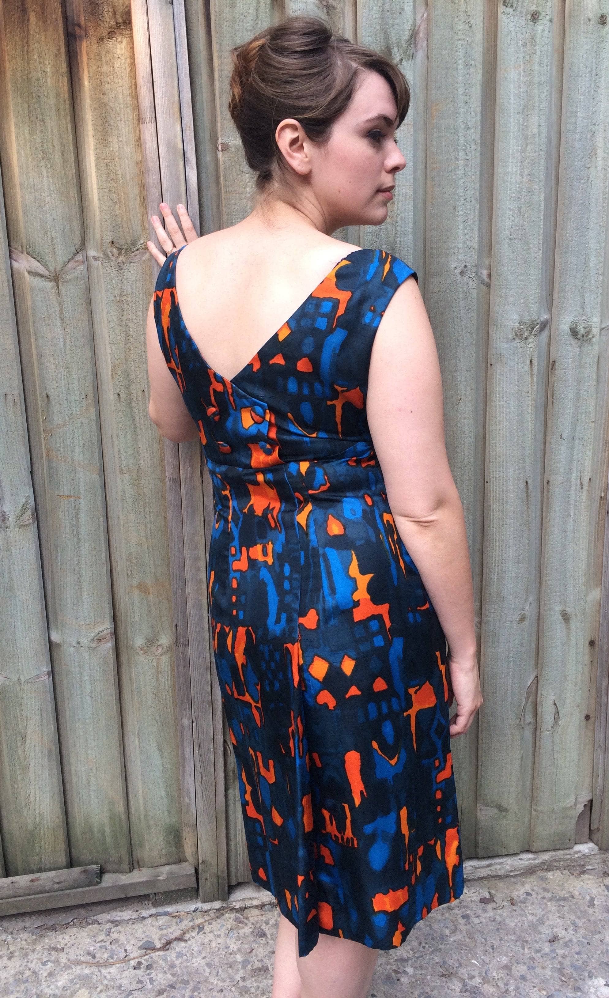 Back view of 1960s Wrap Back Sleeveless Silk Cocktail Dress Size Medium sold by bohemevintage.com Montréal