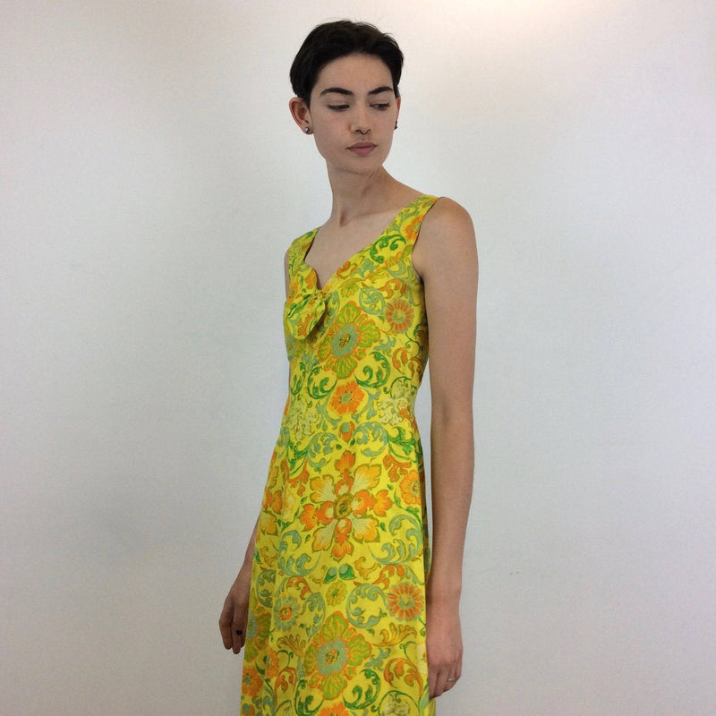 Side view of 1970s Bold Print Yellow Silk Dress without the Bolero, sold by bohemevintage.com Montréal