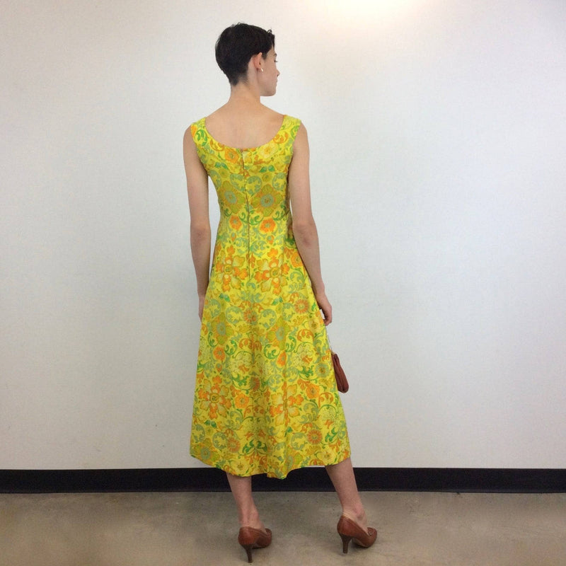 Back view of 1970s Bold Print Yellow Silk Dress without the Bolero, sold by bohemevintage.com Montréal
