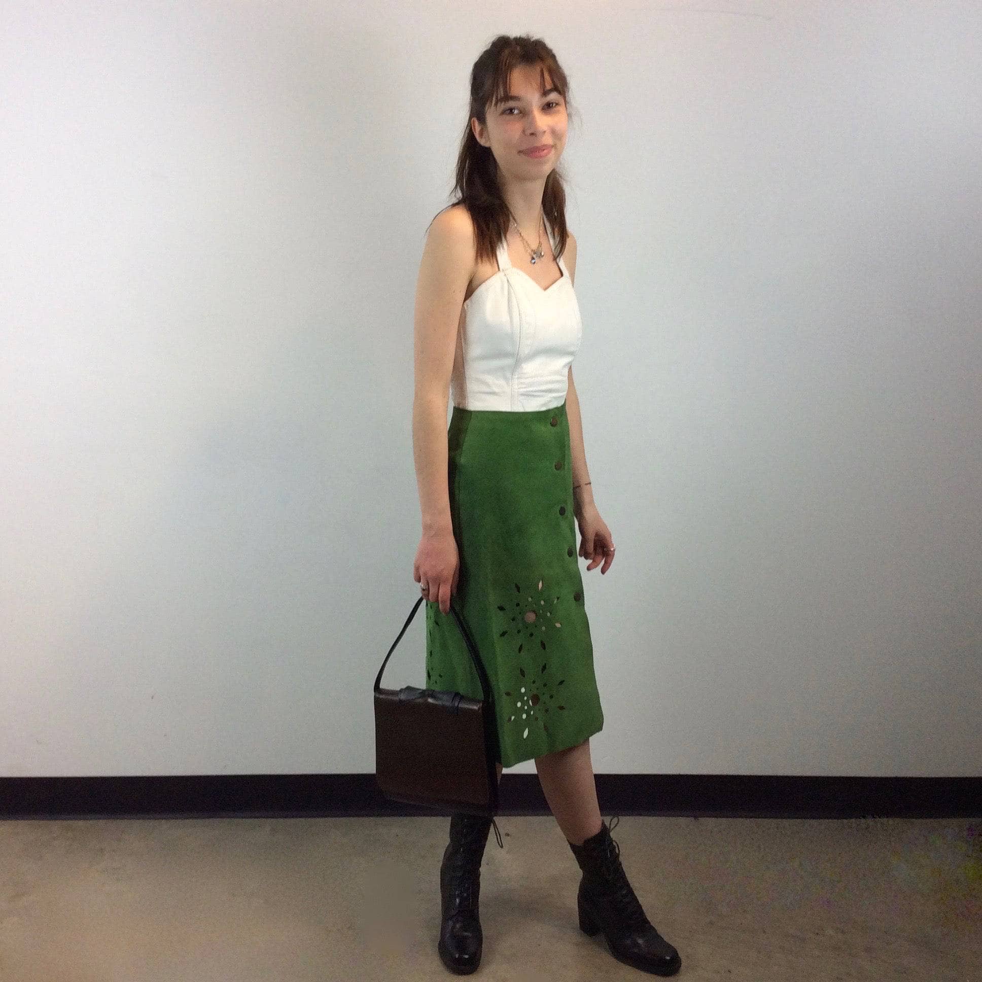 1970s Cut Out Green Suede Skirt sold by bohemevintage.com Montréal