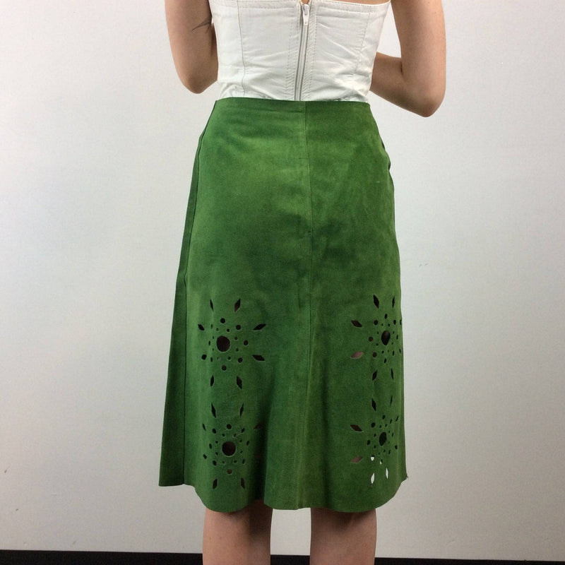 Back view of 1970s Cut Out Green Suede Skirt sold by bohemevintage.com Montréal