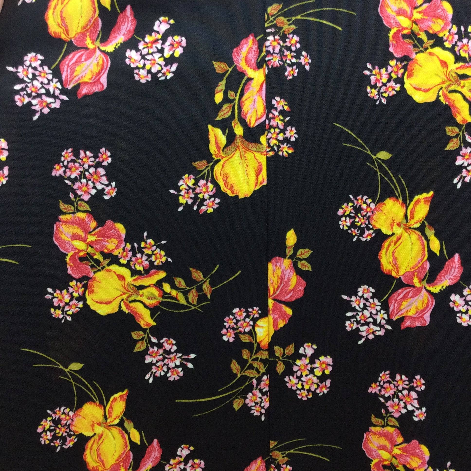 Close up view of fabric of 1970s Floral Print Fit and Flare Maxi Dress Size Medium sold by bohemevintage.com