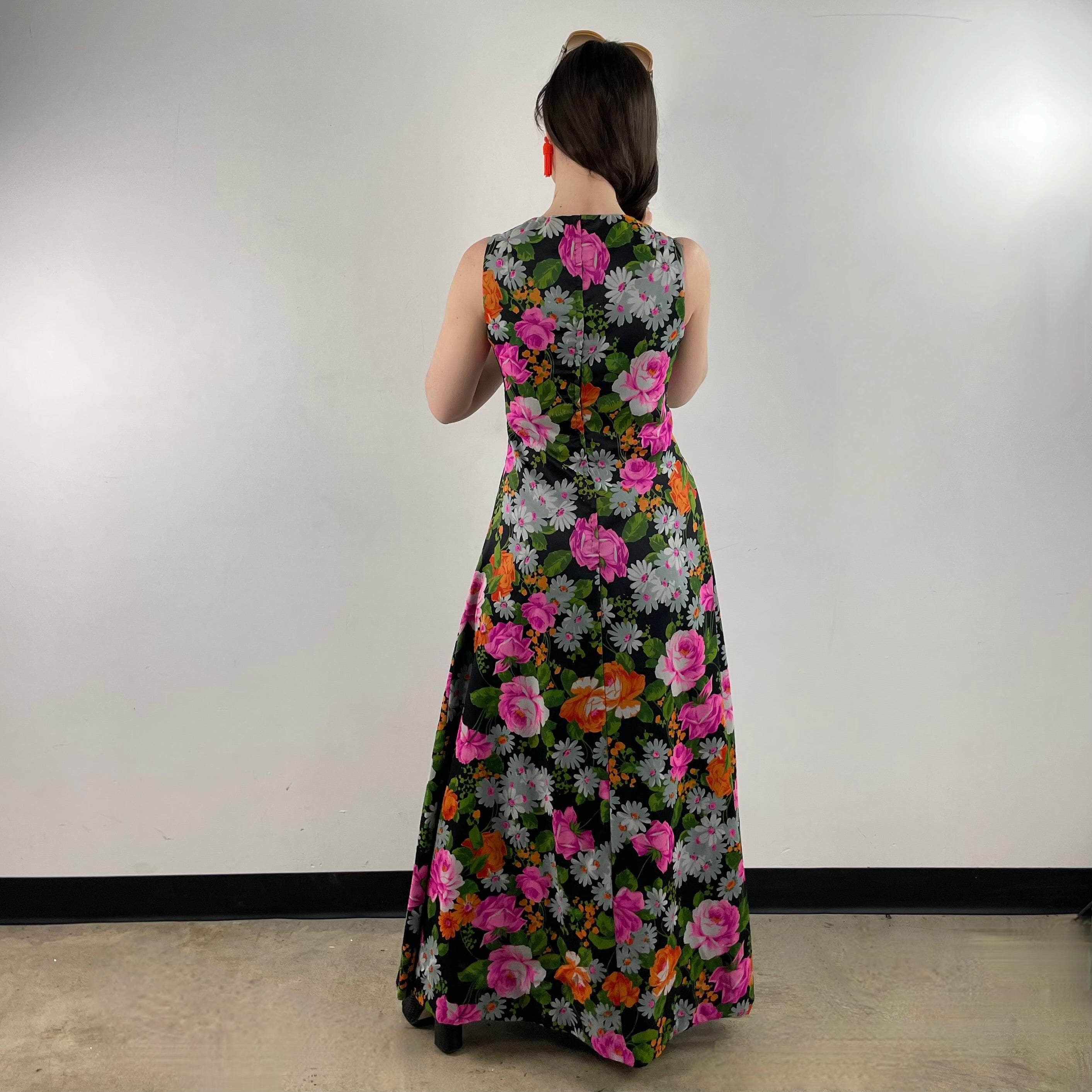 Back view of 1970s Floral Print Flared Maxi Dress size Small/Medium sold at bohemevintage.com Montreal