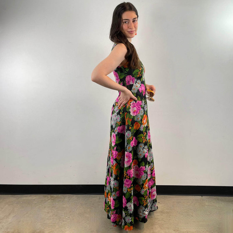 Side view of 1970s Floral Print Flared Maxi Dress size Small/Medium sold at bohemevintage.com Montreal