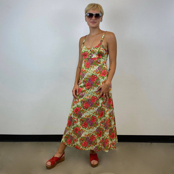  1970s Floral Print , Fit and Flare, Bold Floral Print, lightweight synthetic fabric, size small, thin straps, empire waist,  Maxi Summer Dress, sold by bohemevintage.com Montréal
