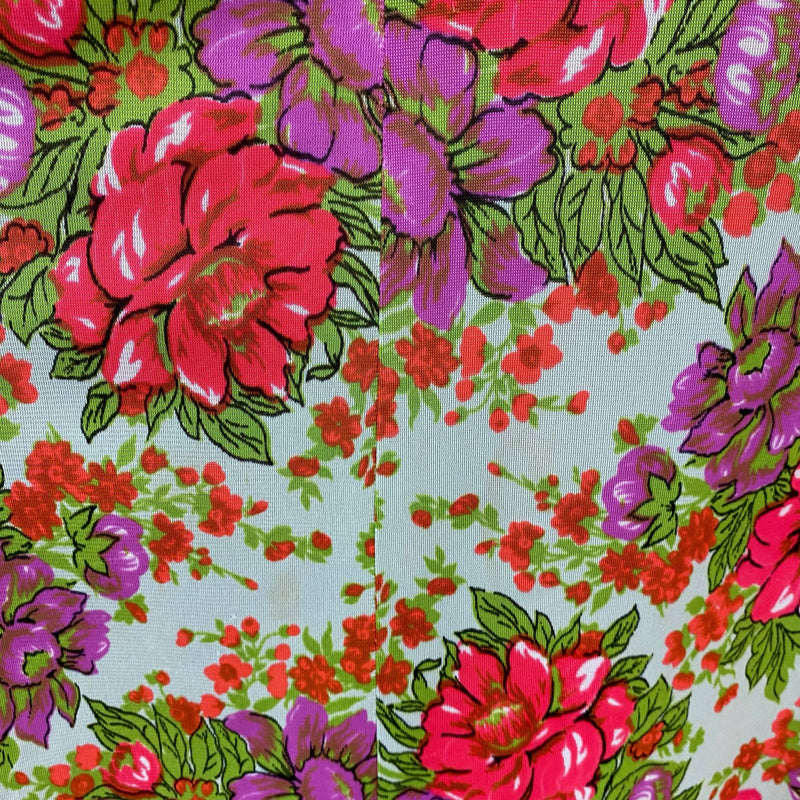 Close-up of Print Design of 1970s Floral Print , Fit and Flare, Bold Floral Print, lightweight synthetic fabric, size small, thin straps, empire waist, Maxi Summer Dress, sold by bohemevintage.com Montréal