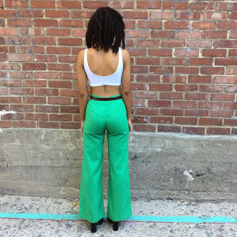 Back view of 1970s Green High Waisted Flared Pants Size Extra Small/Small, Sold by bohemevintage.com Montréal