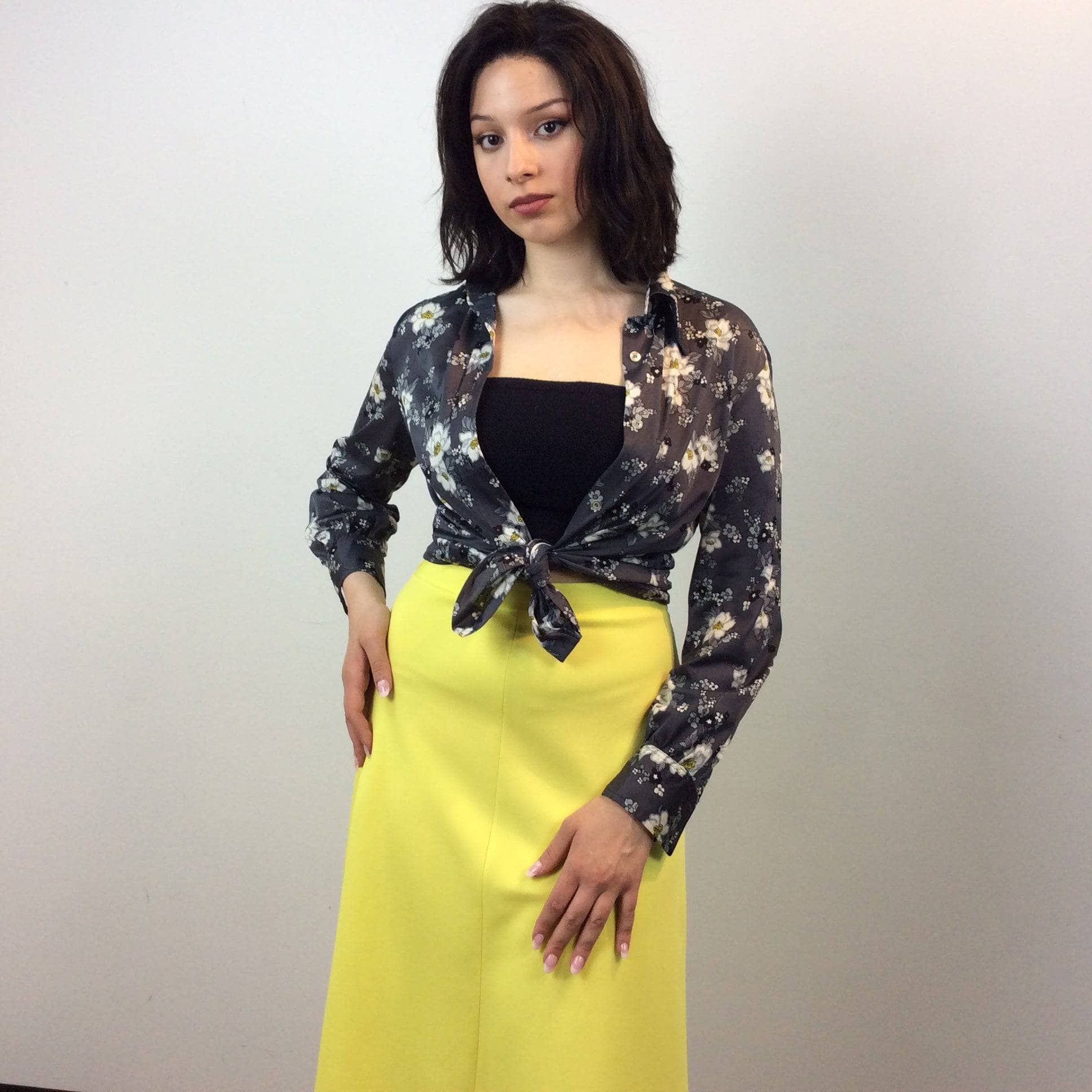 1970s Grey Floral Print Button Up Blouse tied at the waist size Medium Large worn with white belt sold by Bohemevintage.com Montreal