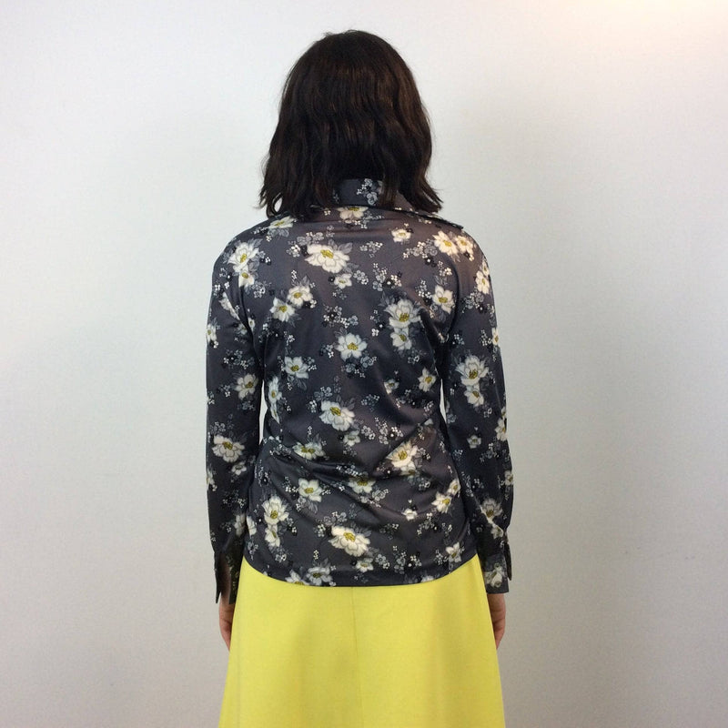 Back view of 1970s Grey Floral Print Button Up Blouse size Medium Large sold by Bohemevintage.com Montreal