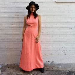 Front view of 1970s Handmade Coral Pink Floor-Length Sleeveless Gown Size small-Medium sold at bohemevintage.com MontreaL