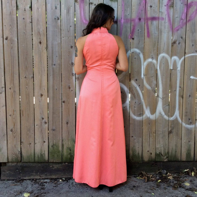 Back view of 1970s Handmade Coral Pink Floor-Length Sleeveless Gown Size small-Medium sold at bohemevintage.com MontreaL