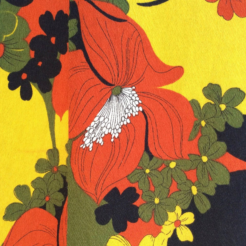 Close-up of design of 1970s Bold floral print Hawaiian Halter top, empire waist maxi dress Sold by bohemevintage.com 