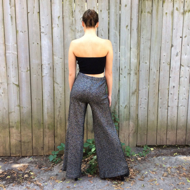 Back view of 1970s High Waisted Silver Knit Wide-leg Pants Size Small/Medium, sold by bohemevintage.com Montréal