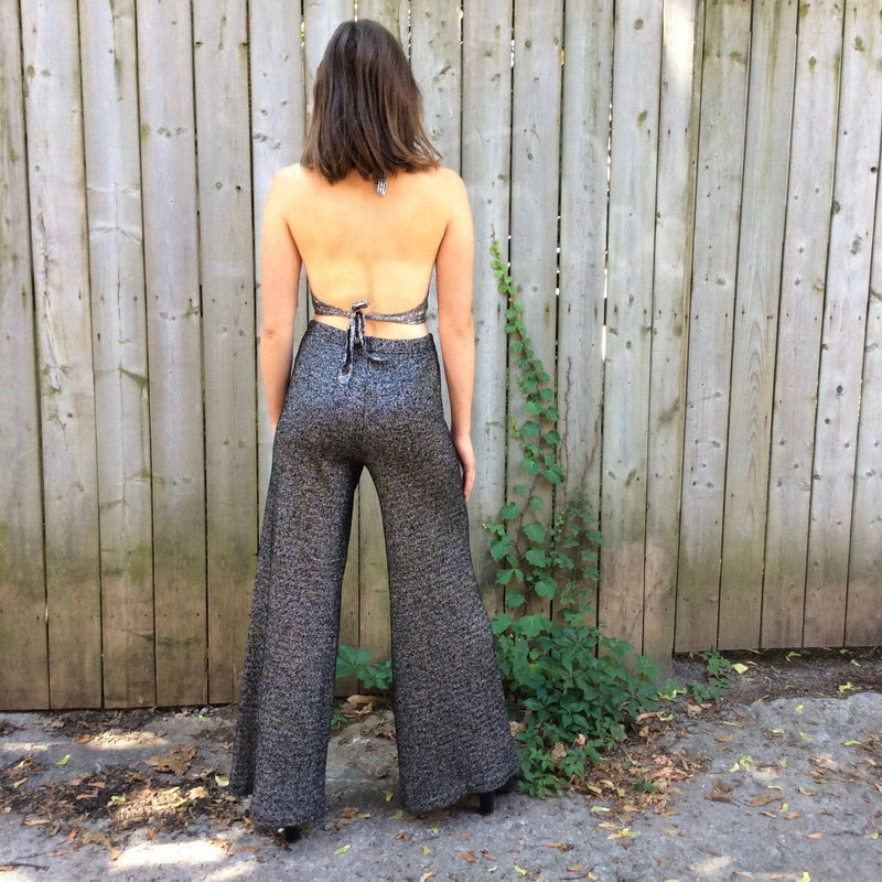 Back view of 1970s High Waisted Silver Knit Wide-leg Pants Size Small/Medium, sold by bohemevintage.com Montréal