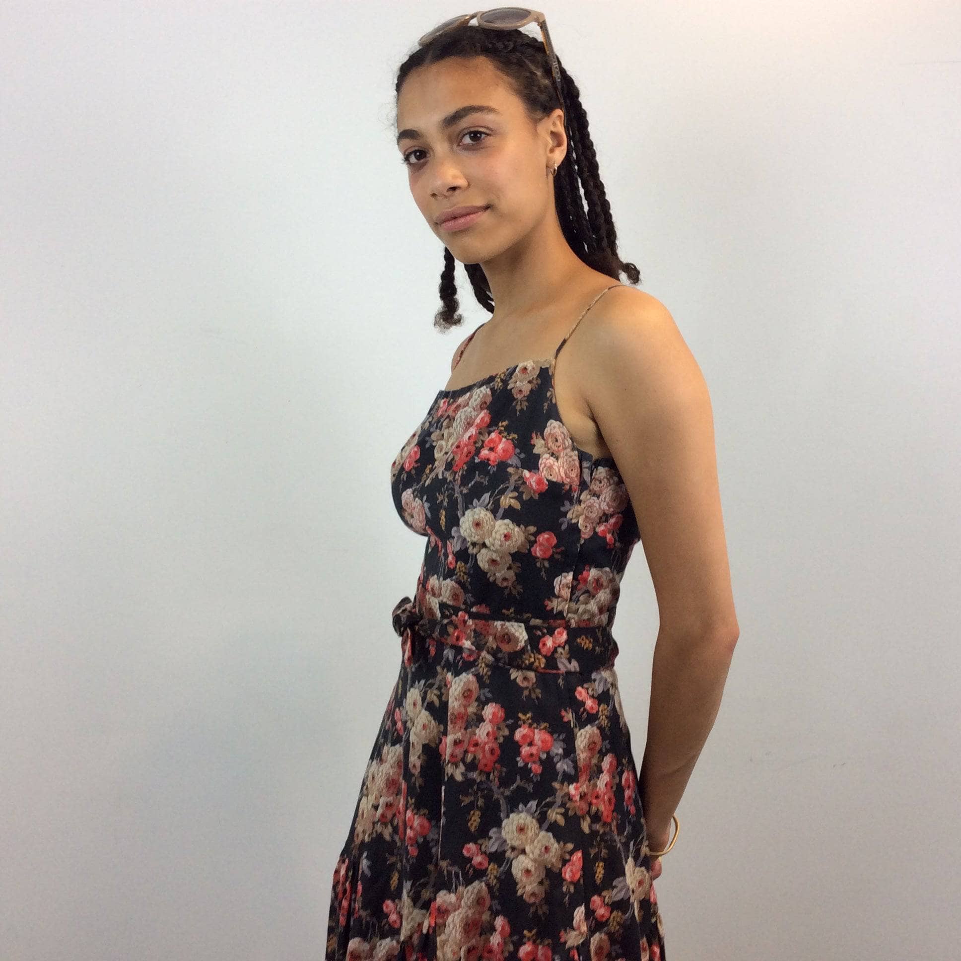 Upper Side view of 1970s Jean Jourdan Paris Floral Print Ruffle Midi Dress size Small sold by bohemevintage.com Montréal