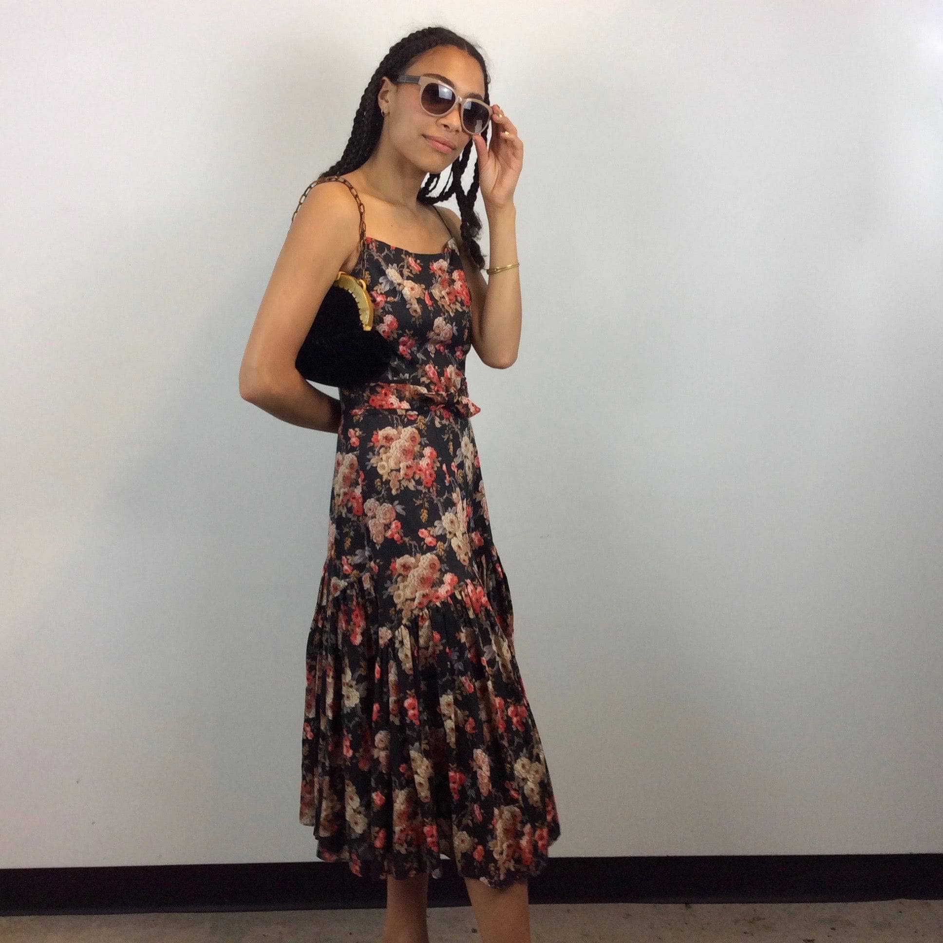 Side view of 1970s Jean Jourdan Paris Floral Print Ruffle Midi Dress size Small sold by bohemevintage.com Montréal