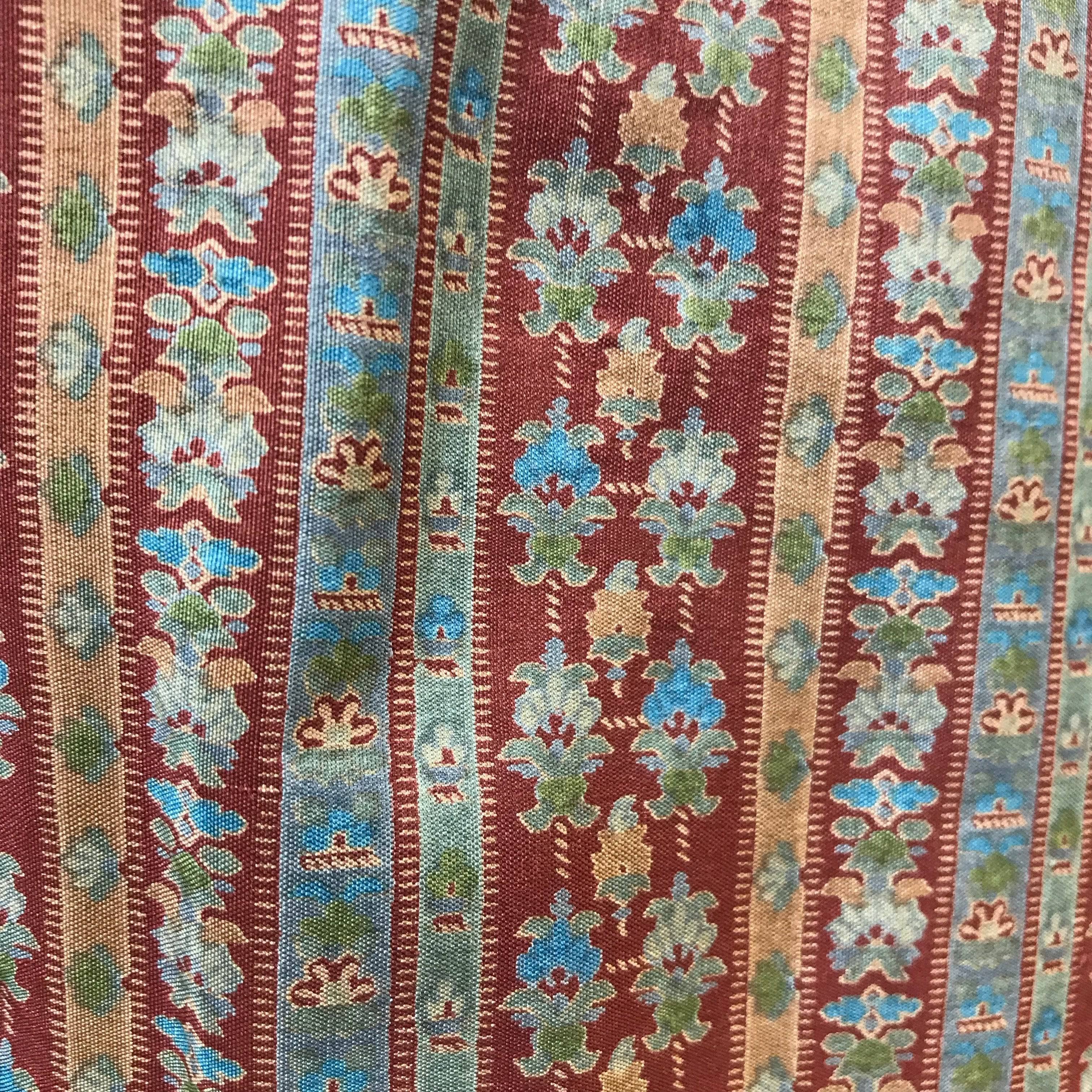 Close up view of fabric print of 1970s Yves Saint Laurent Rive Gauche Pleated Silk Midi Skirt Size Medium sold by bohemevintage.com Montreal